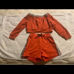 Girls size 7/8 orange short set.